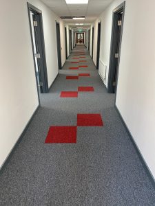 Apartment Hallway with Resilient Carpet Tiles